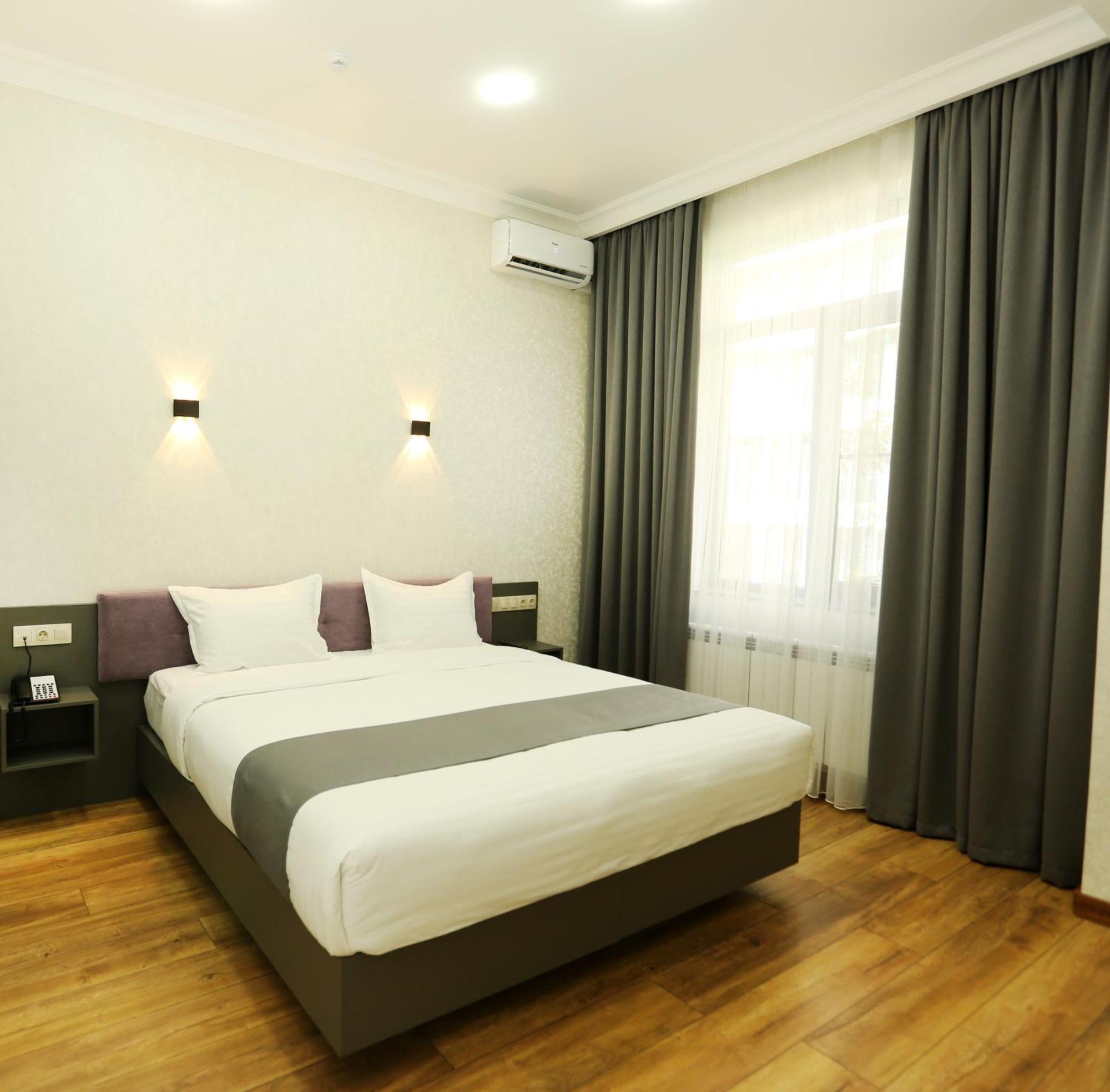 Parklane Hotel Ташкент Номер фото